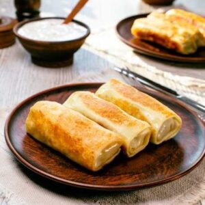 Mlyntsi (crepes) med kyckling och svamp