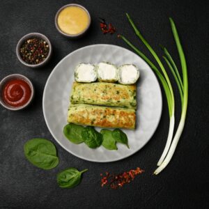 Mlyntsi (crepes) med spenat och färskost